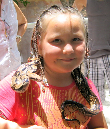 Mika with snake around her head